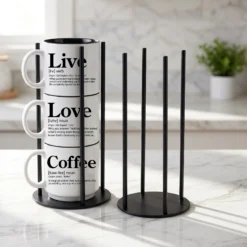 Our black metal Storyteller Display Stands hold a stack of 14-ounce Coffee & Words mugs and fit neatly on any counter or coffee bar.