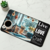 The Live + Love + Craft coffee and desk mat honors creativity, handmade artistry and the soulful work of tangling threads.
