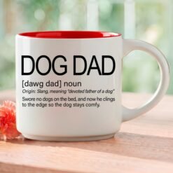 Dog Dad coffee mug, 14-ounce white stackable mug with Dog Dad definition in Whimsical Word Story Style and red interior.